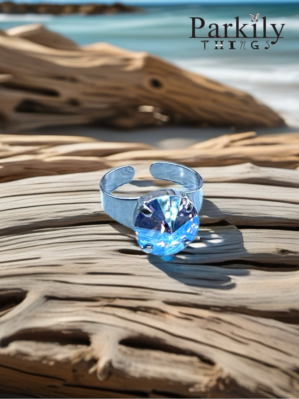 Handcrafted ring made with Swarovski light sapphire shimmer crystal adjustable